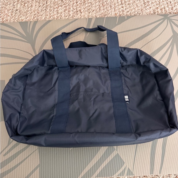 Uniqlo Collapsible Bag Navy NWOT - Picture 9 of 9
